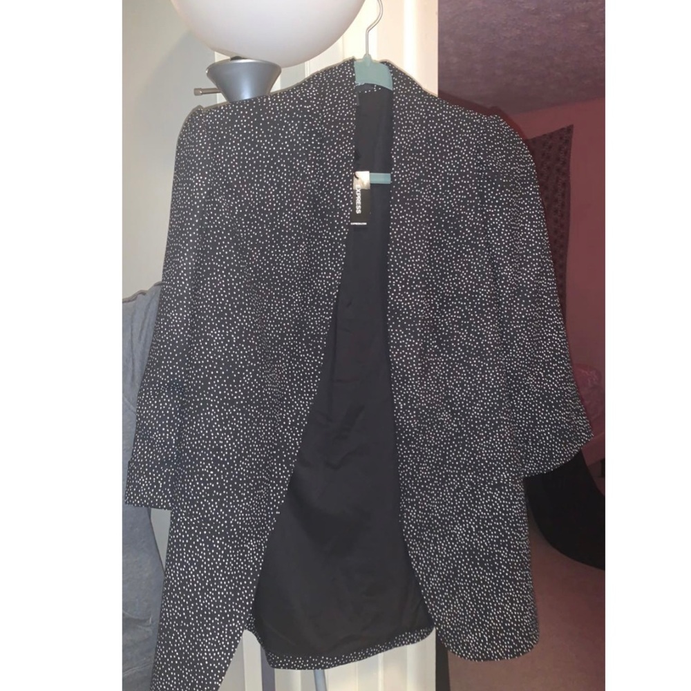 Black with white polkadots express blazer